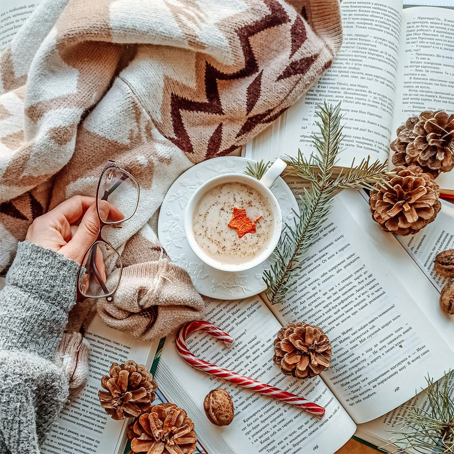 Coffee, Books, Santa Can and Cones Photo by Катерина Сокол in Pexels